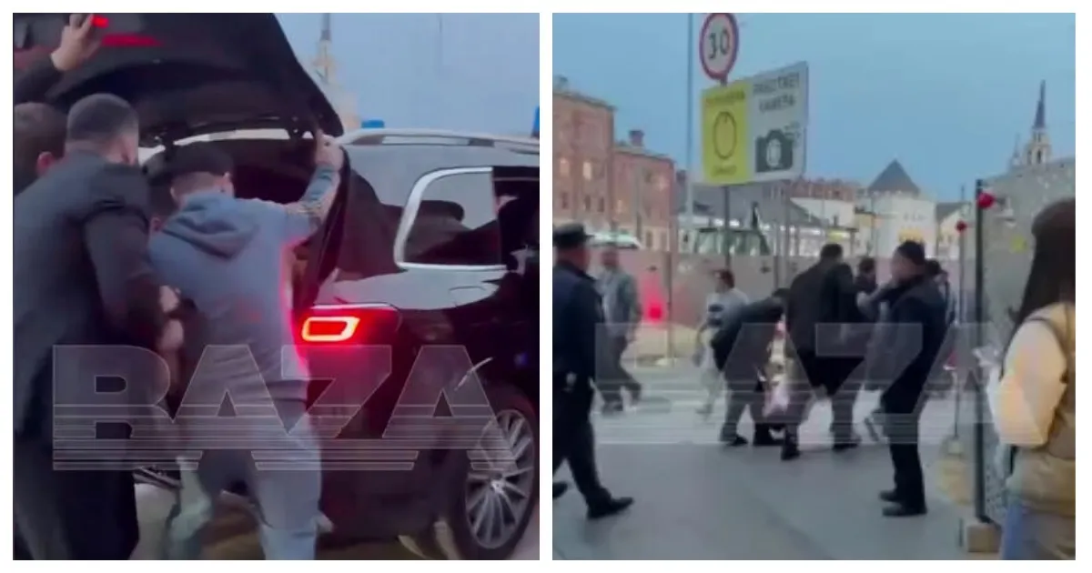 Пятеро мужчин затащили человека в багажник посреди Москвы Пятеро мужчин затащили человека в багажник посреди Москвы
